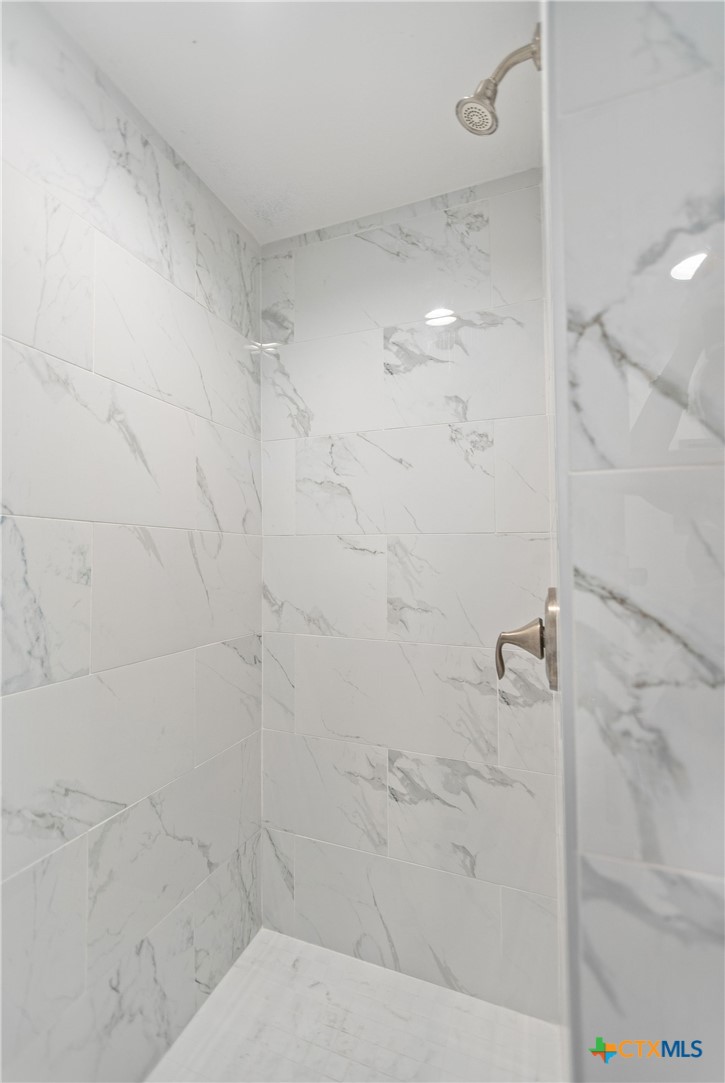 253 Carrie Street Port O'Connor, TX 77982 - Photo 23 of 33 Secondary Bathroom Shower