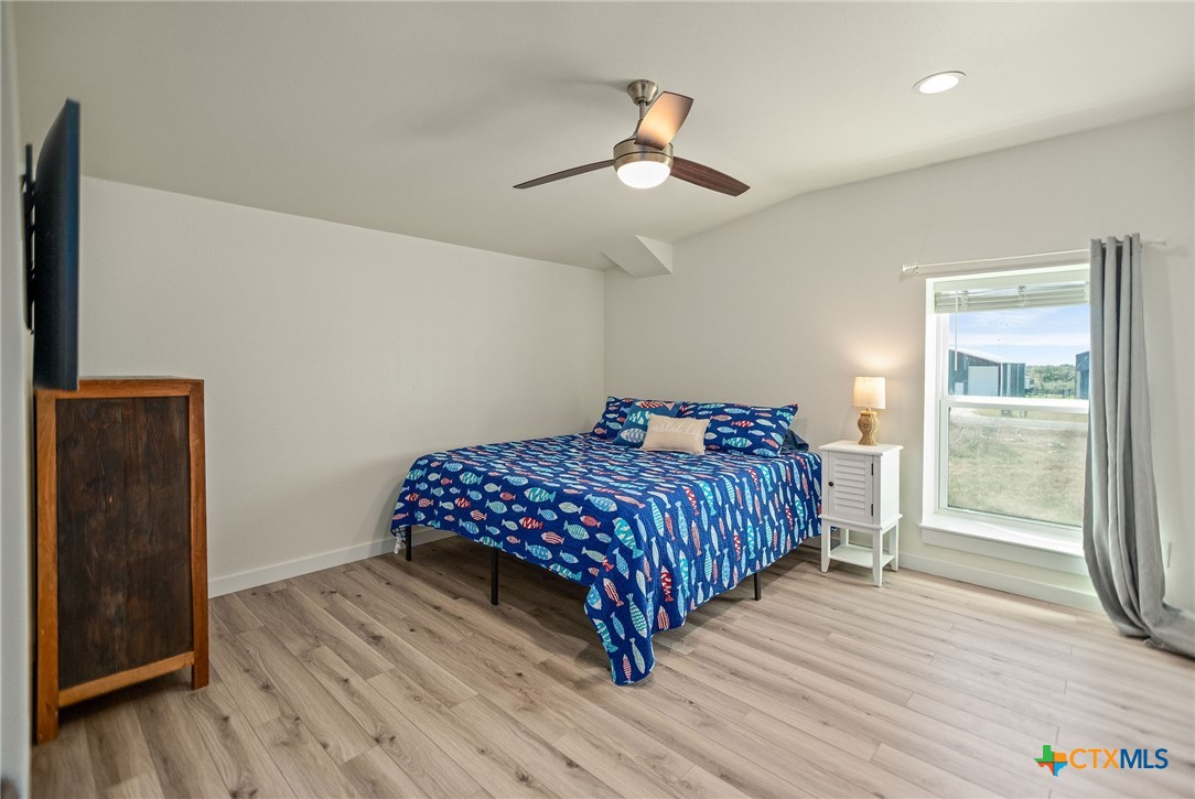 253 Carrie Street Port O'Connor, TX 77982 - Photo 24 of 33 Bedroom with En-Suite Bathroom