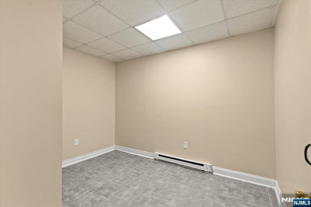 331 Market Street Paterson, NJ 07501 - Photo 10 of 25 an empty room with a workbench