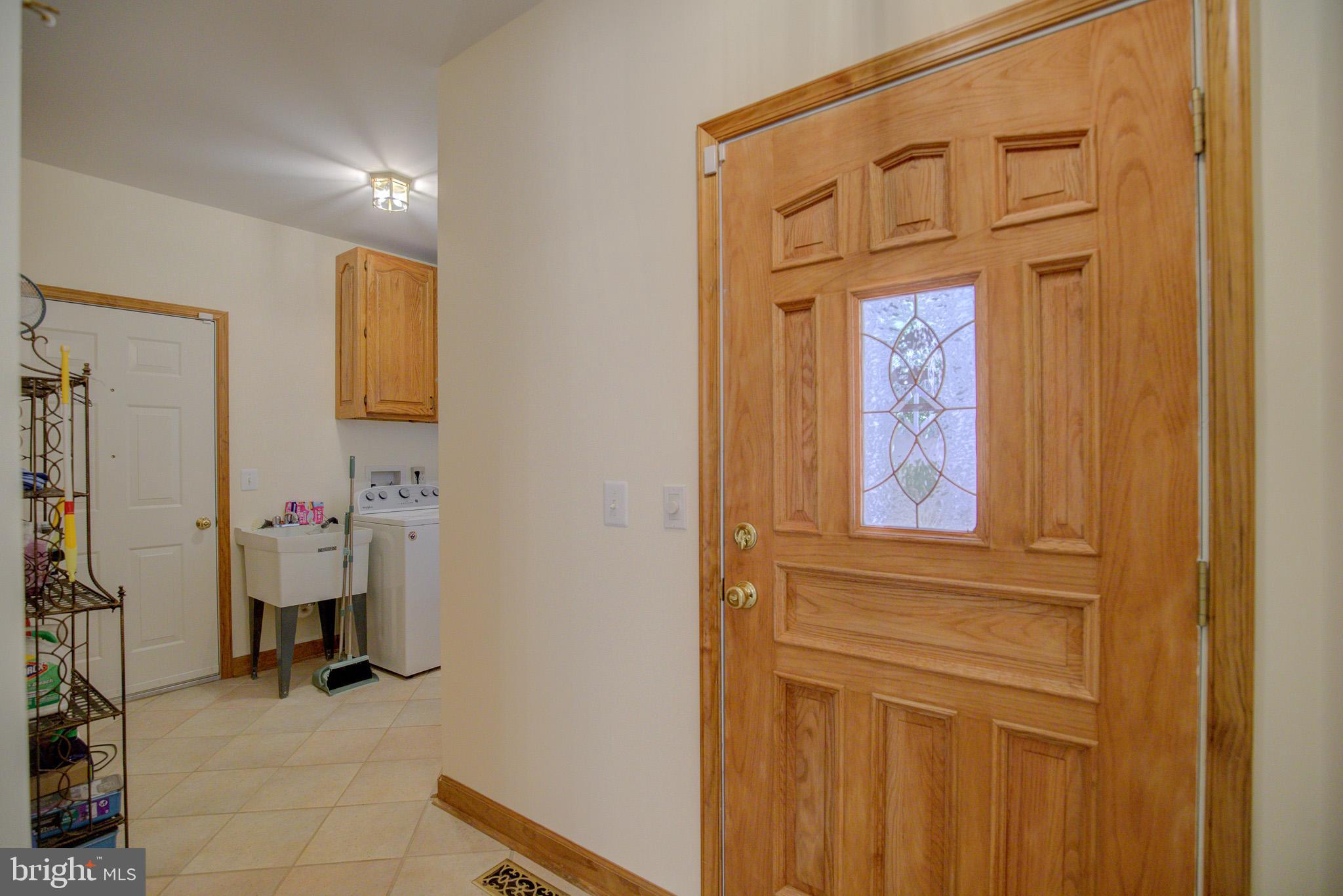 813 Blacks Hill Road Great Falls, VA 22066 - Photo 38 of 92 Side Entrance to Mud Room