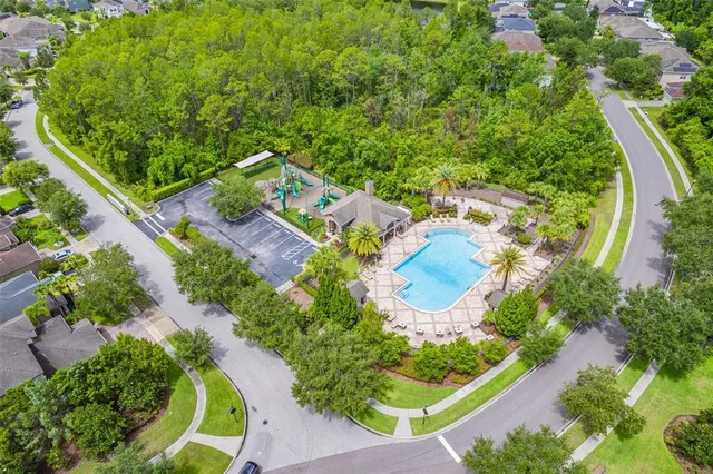 an aerial view of a house with a garden