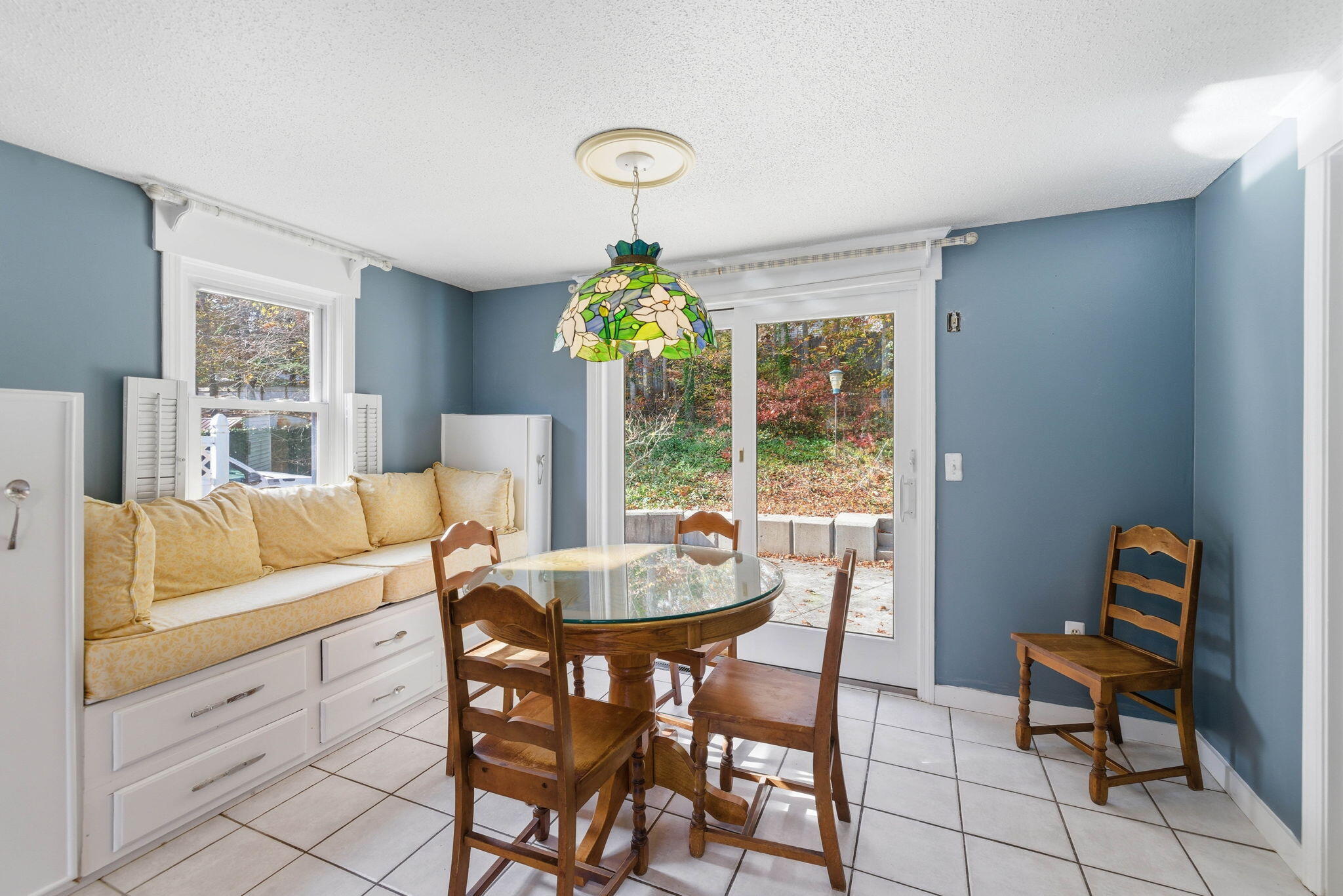 544 Cotuit Road Mashpee, MA 02649 - Photo 13 of 30 a living room with furniture and a table