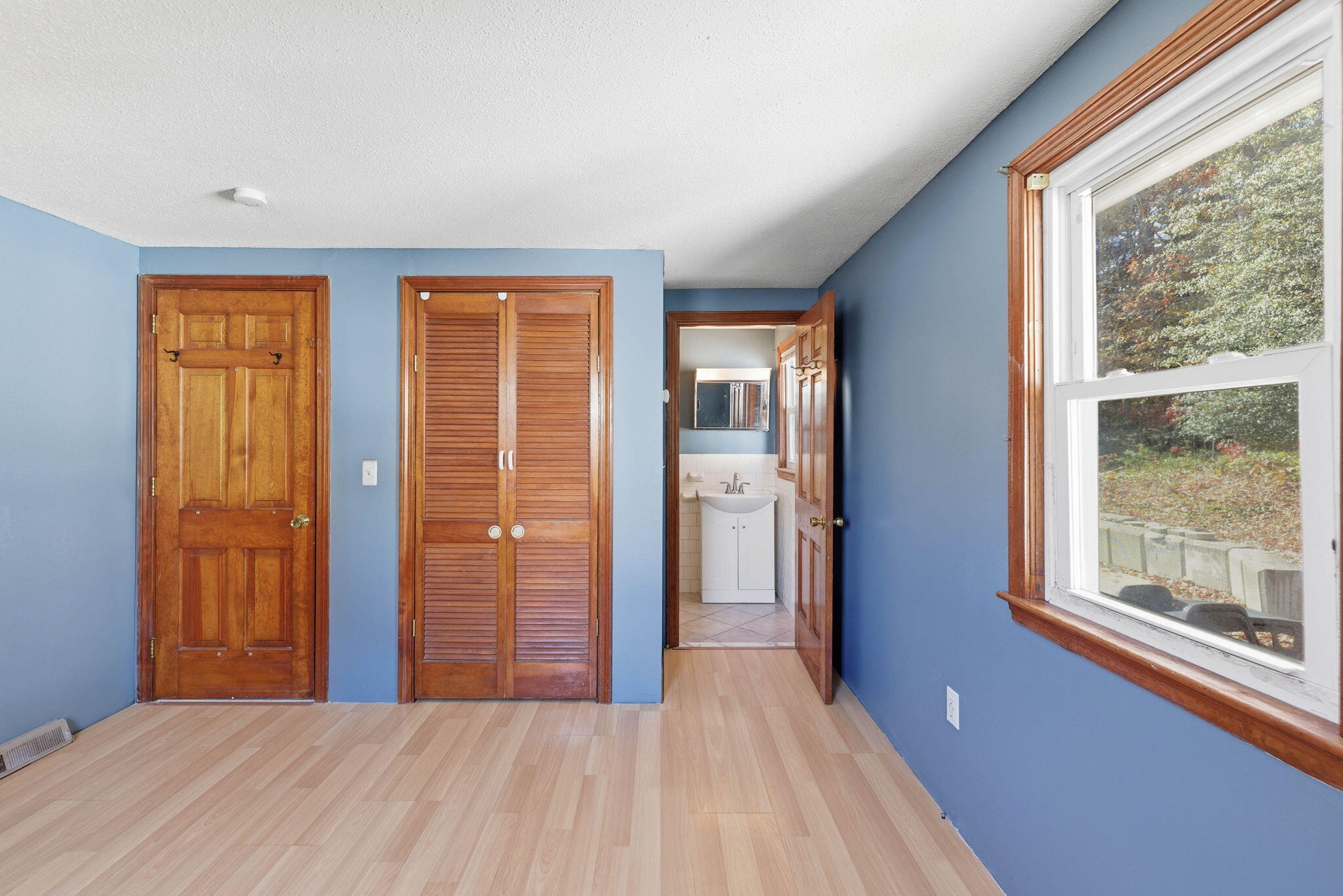 544 Cotuit Road Mashpee, MA 02649 - Photo 21 of 30 a view of a room with large windows