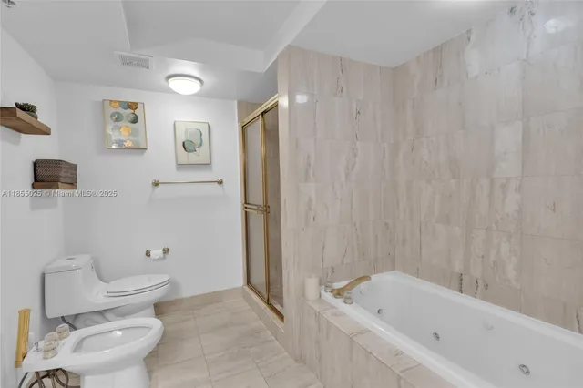 $885,000 | 1800 Sunset Harbour Drive, Unit 1003, Miami Beach, FL 33139