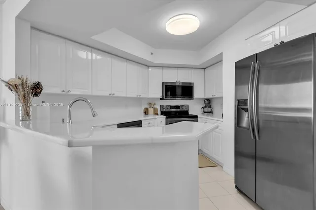 $885,000 | 1800 Sunset Harbour Drive, Unit 1003, Miami Beach, FL 33139