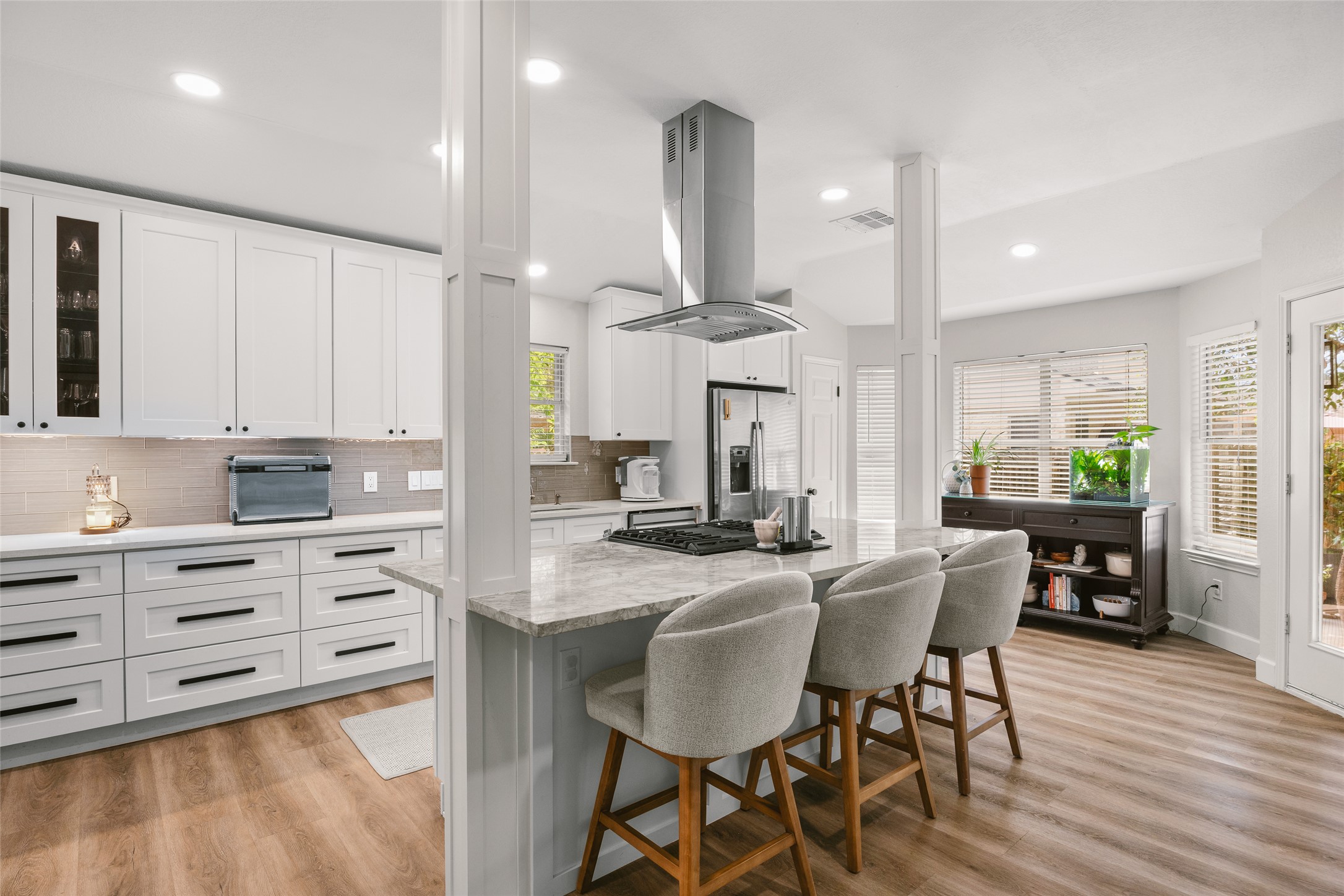 2202 Old Mill Road Cedar Park, TX 78613 - Photo 10 of 23 The kitchen boasts a well placed island with seating, ample counter space, and modern appliances.