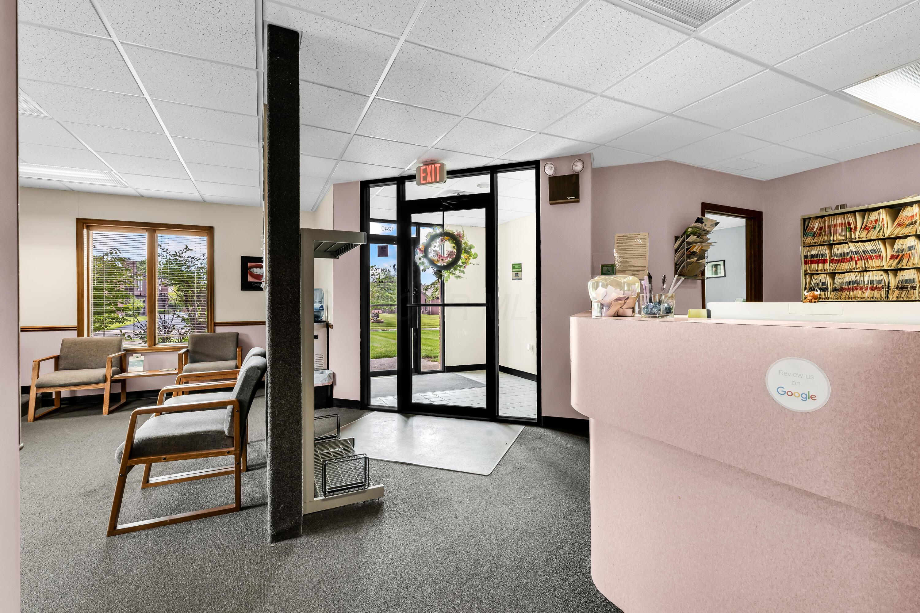 1240 Crescent Heights Road Marion, OH 43302 - Photo 5 of 60 • Blue carpet • Ivory painted walls • Acoustic ceiling tiles