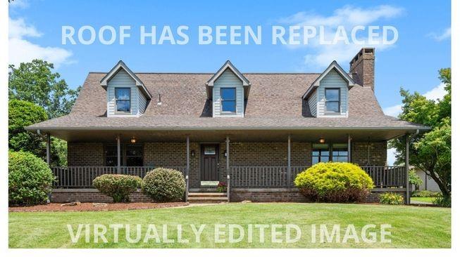 a view of outdoor space yard and front view of a house