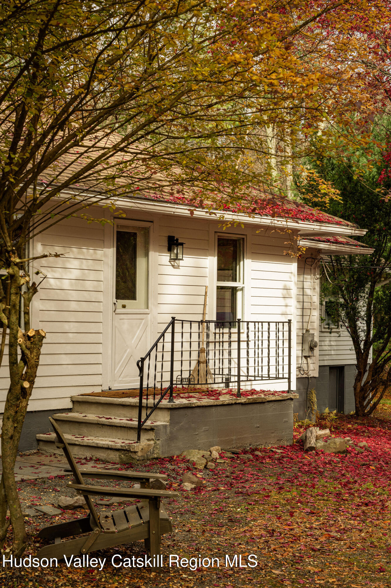 845-849 Peak Road Stone Ridge, NY 12484 - Photo 21 of 50 a front view of a house with a yard