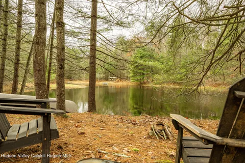 a view of a lake with a bench