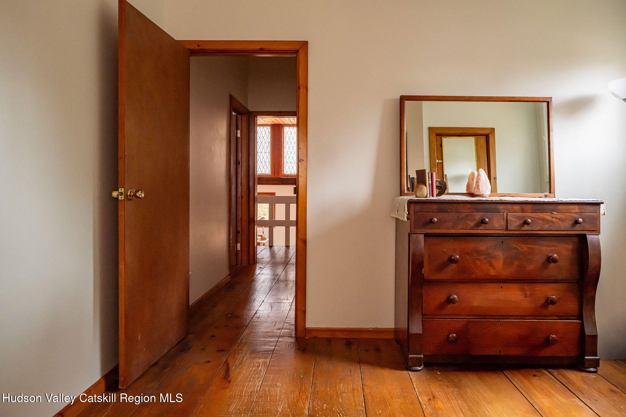 845-849 Peak Road Stone Ridge, NY 12484 - Photo 34 of 50 a view of a hallway with wooden floor and cabinet
