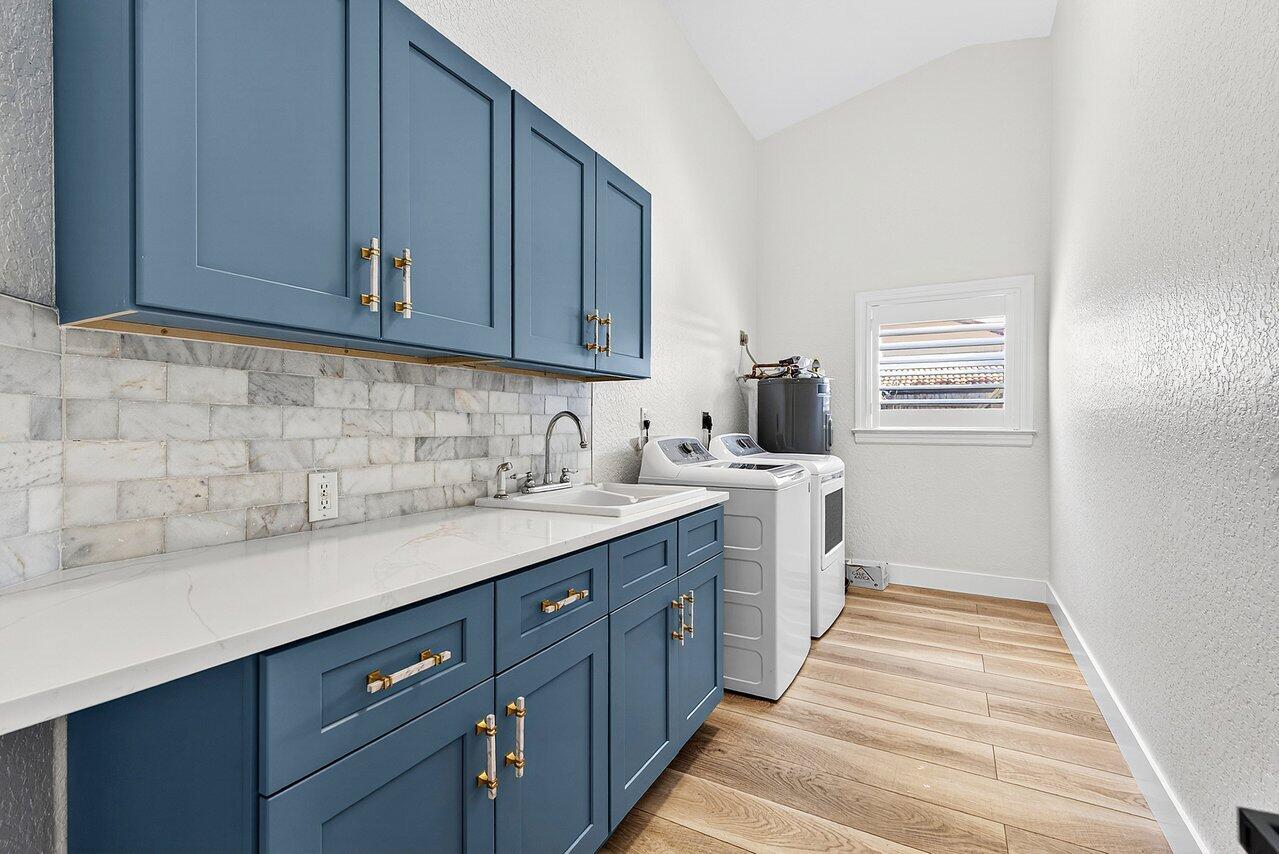 8331 Southeast Quail Ridge Way Hobe Sound, FL 33455 - Photo 13 of 24 Laundry Room
