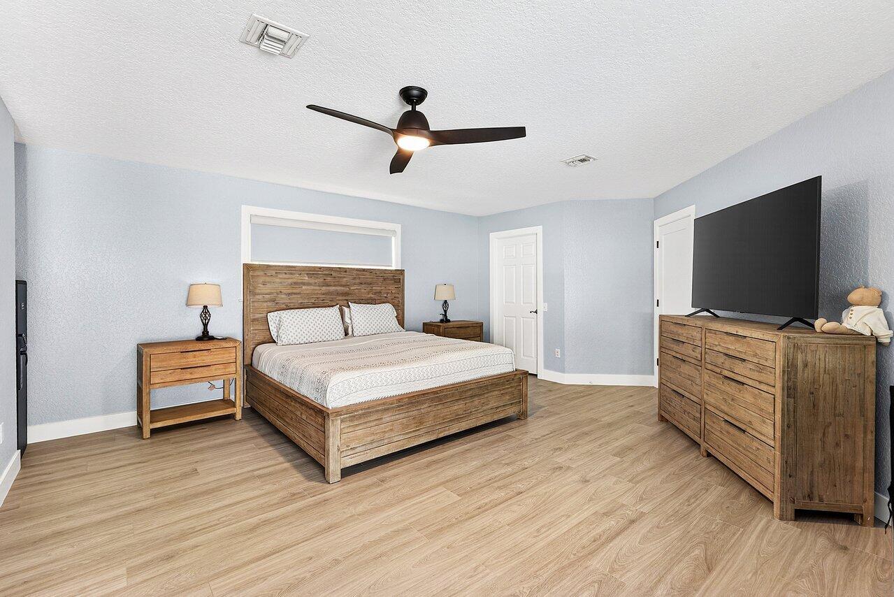 8331 Southeast Quail Ridge Way Hobe Sound, FL 33455 - Photo 14 of 24 Master Bedroom