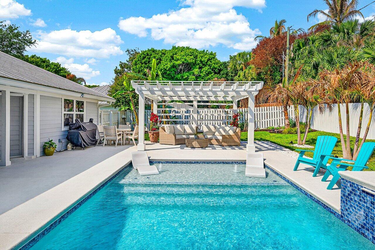 8331 Southeast Quail Ridge Way Hobe Sound, FL 33455 - Photo 17 of 24 Trellis overlooking Pool