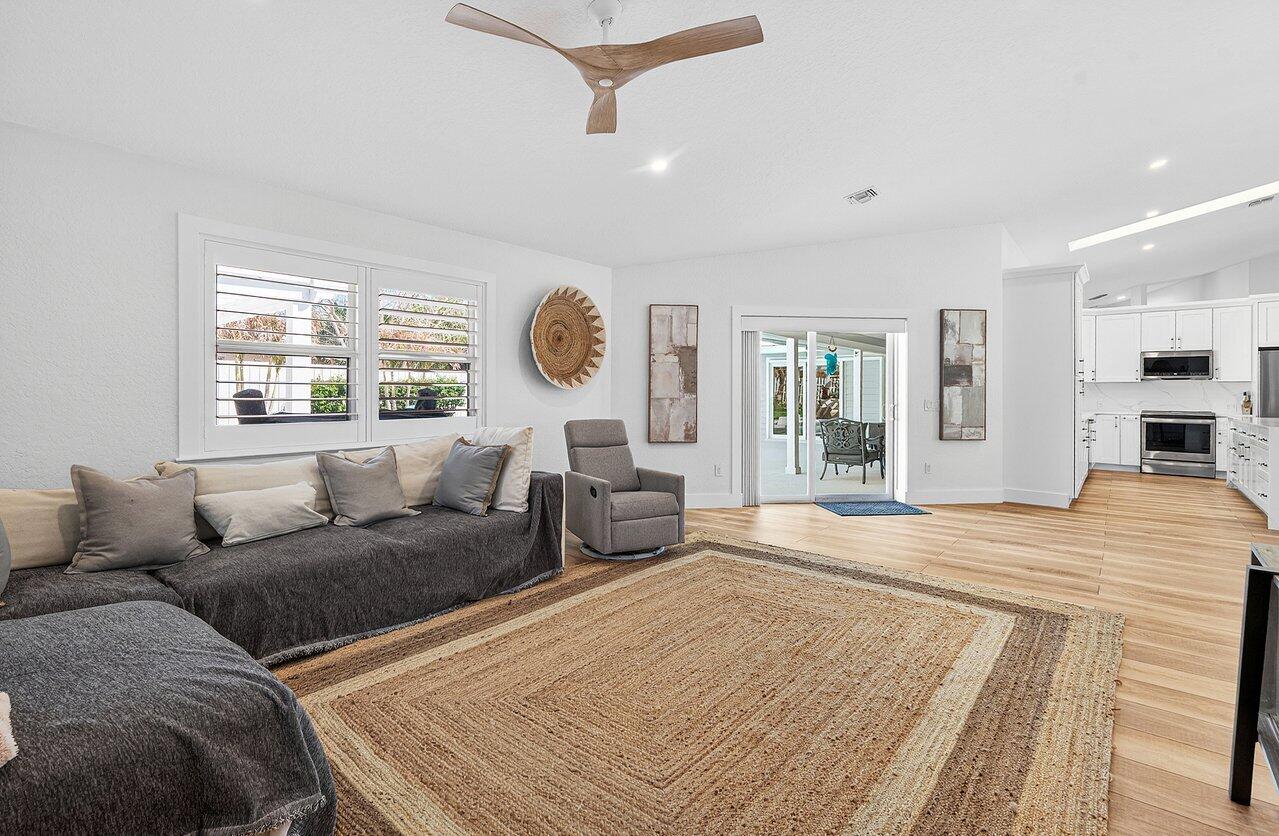 8331 Southeast Quail Ridge Way Hobe Sound, FL 33455 - Photo 8 of 24 Family Room to Kitchen