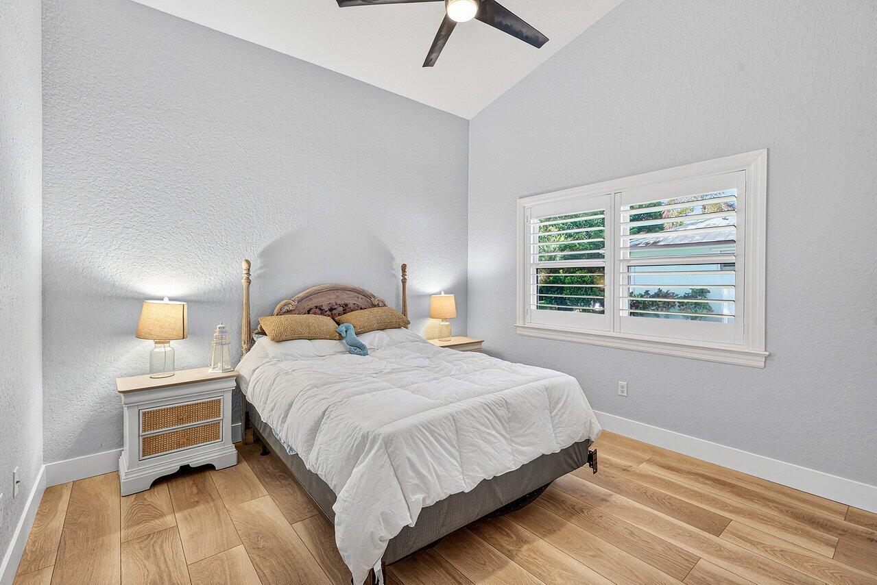 8331 Southeast Quail Ridge Way Hobe Sound, FL 33455 - Photo 10 of 24 iddle Bedroom