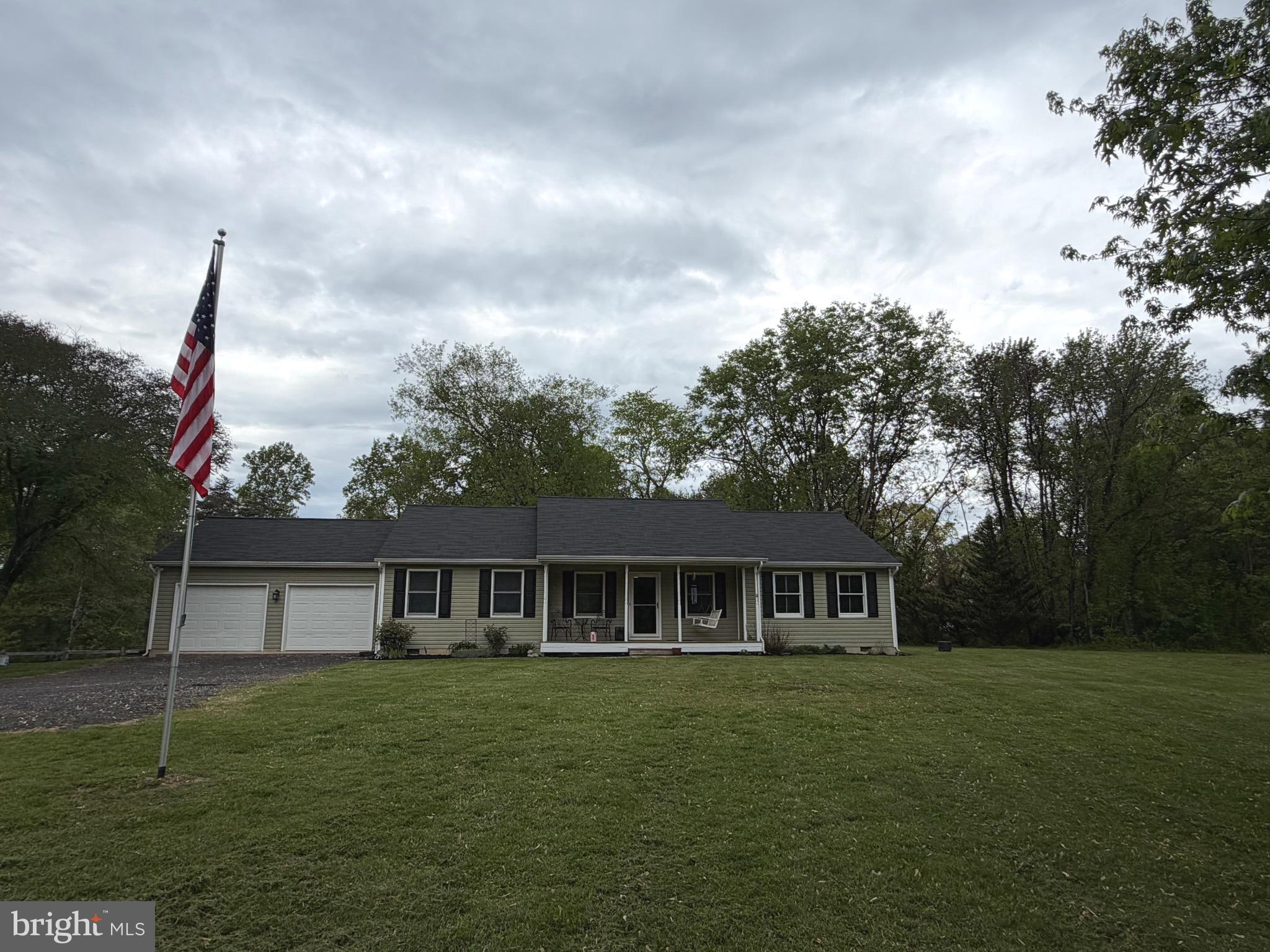 14185 Winks Lane Rixeyville, VA 22737 - Photo 1 of 7 a front of a house with a garden