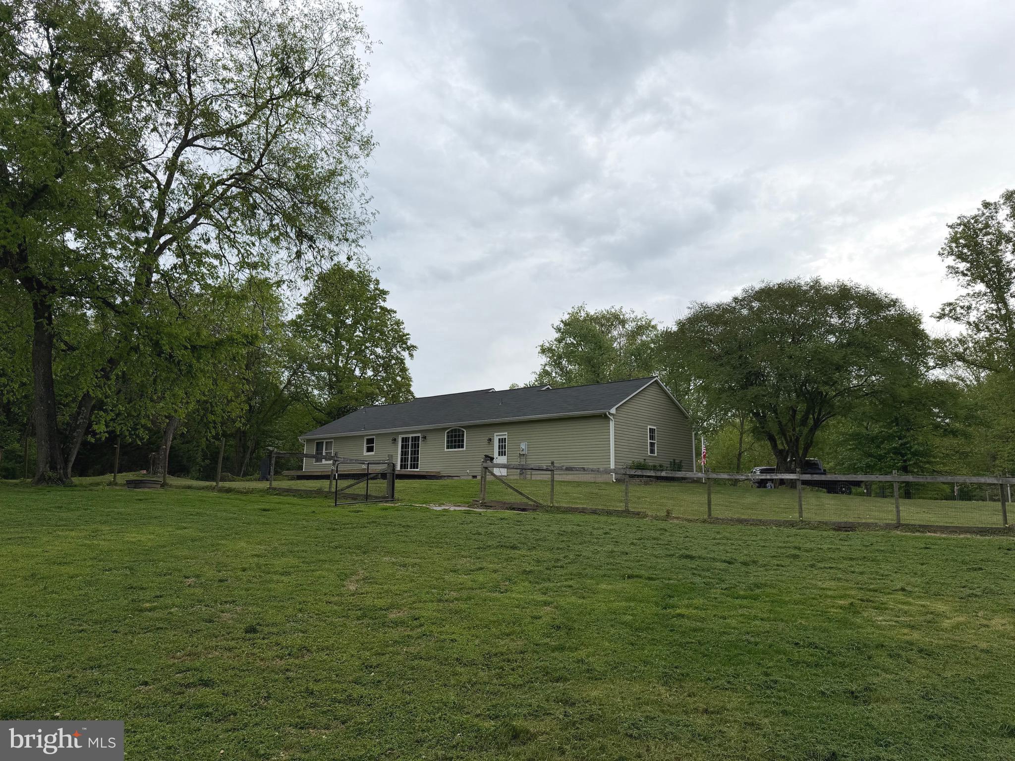 14185 Winks Lane Rixeyville, VA 22737 - Photo 3 of 7 a view of a house with a big yard