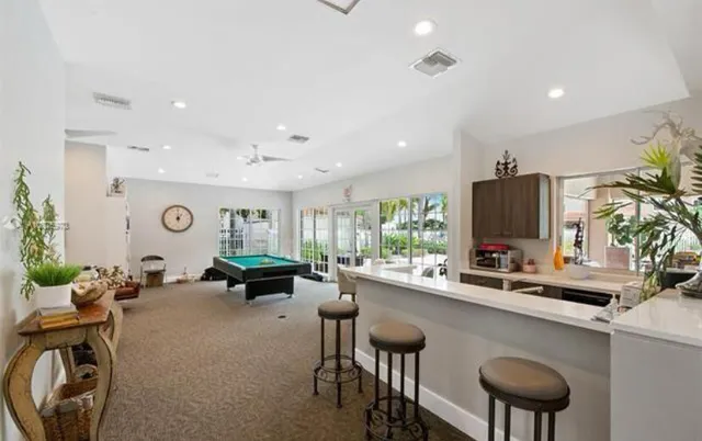 a view of a swimming pool and an ocean view