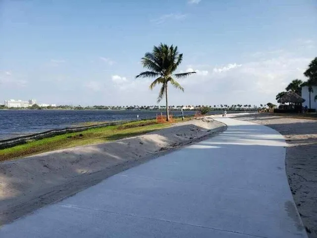 a view of a swimming pool and an ocean view