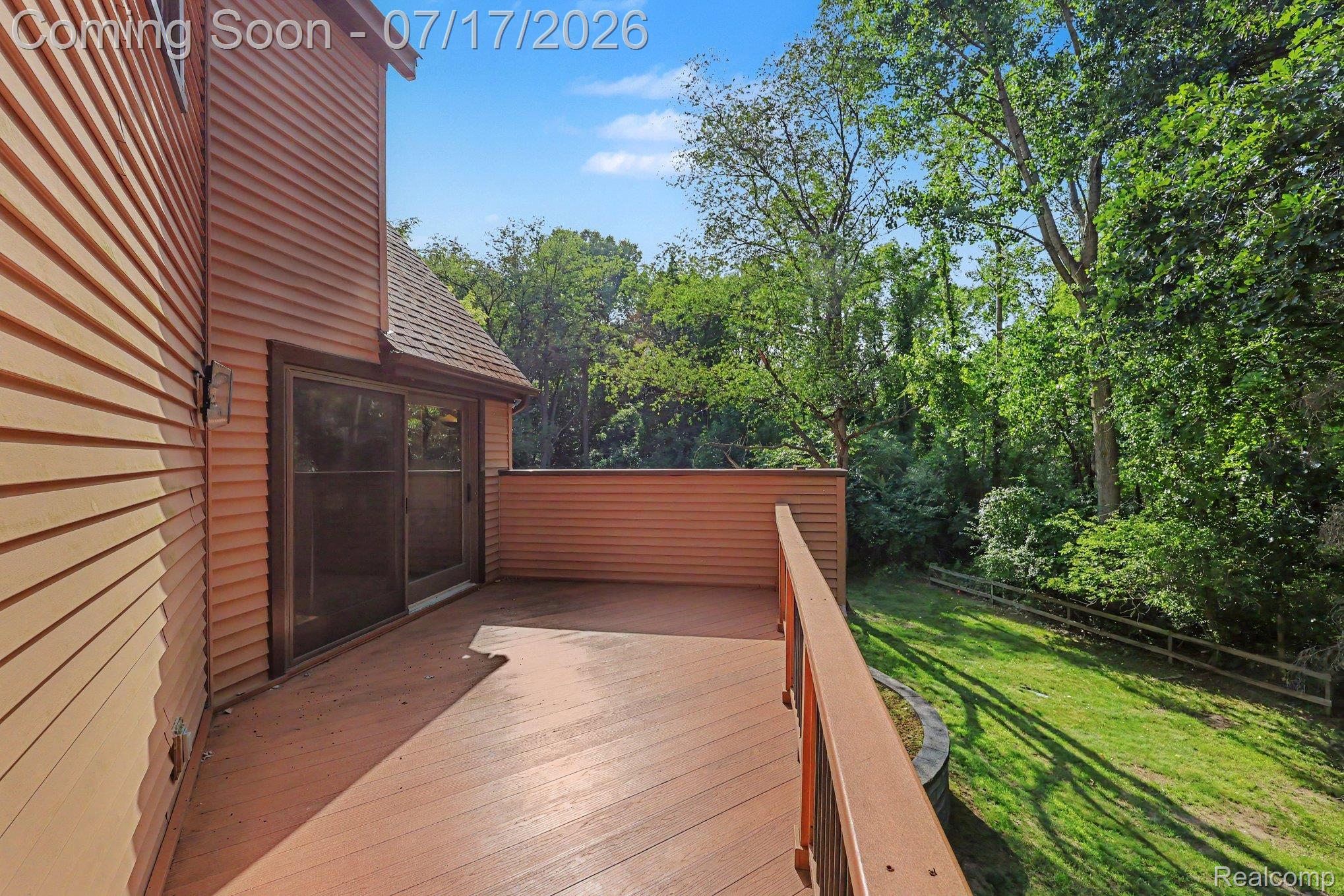 5685 Paint Valley Drive Rochester, MI 48306 - Photo 40 of 66 Spacious outdoor deck featuring wood-finish flooring and railing