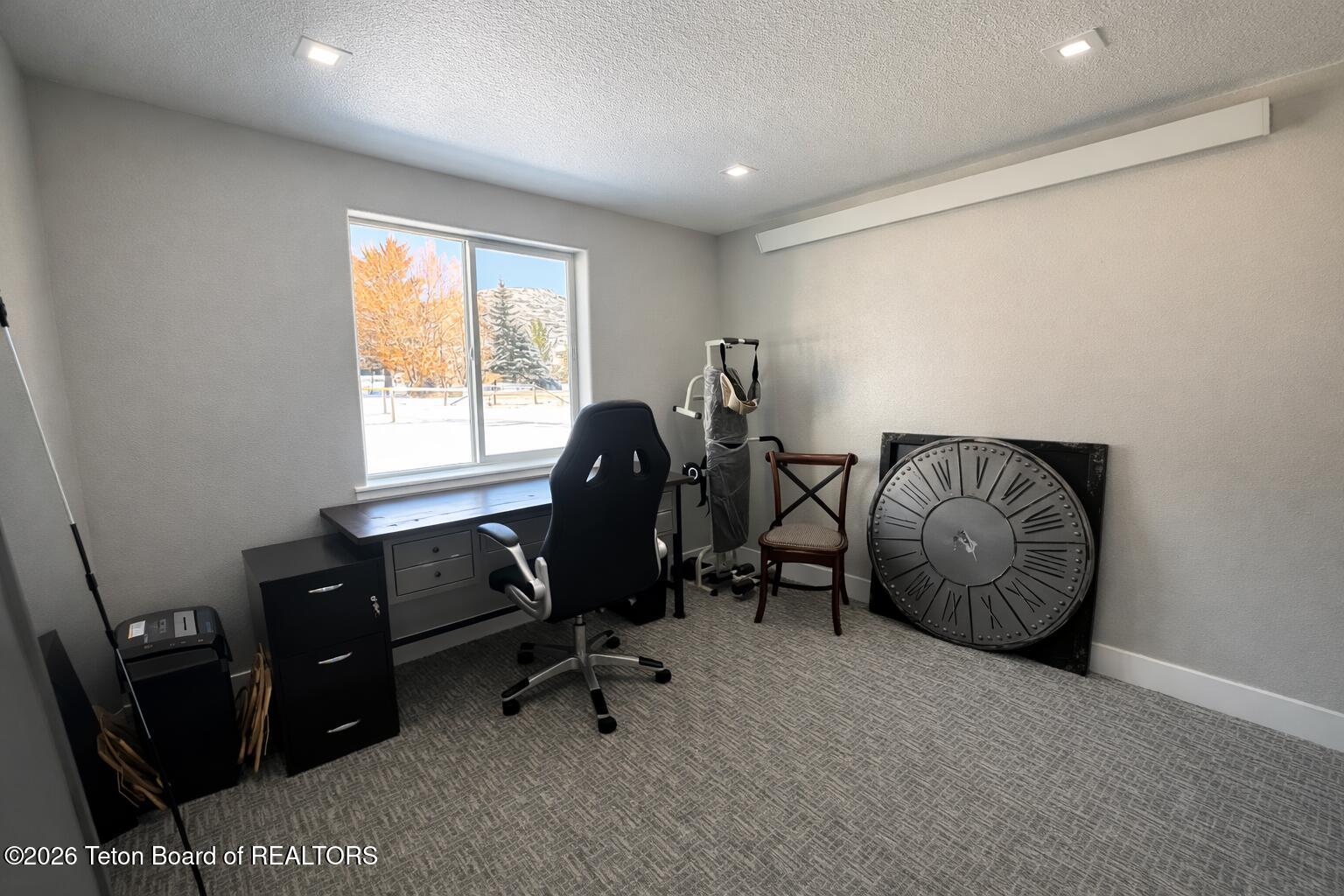 963 Stump Creek Road Auburn, WY 83111 - Photo 29 of 44 Cozy home office with fall view