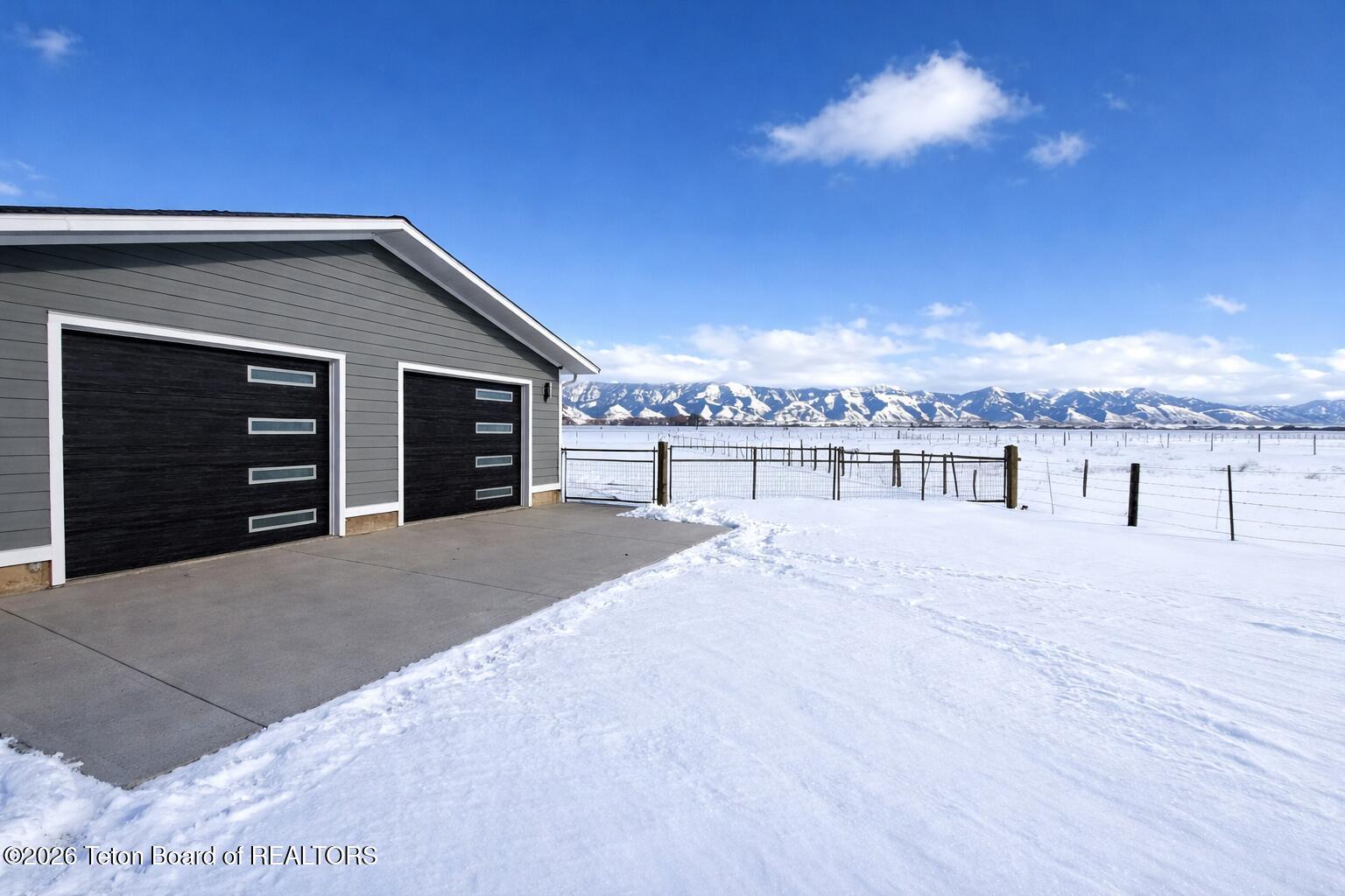 963 Stump Creek Road Auburn, WY 83111 - Photo 4 of 44 Side Yard Garage
