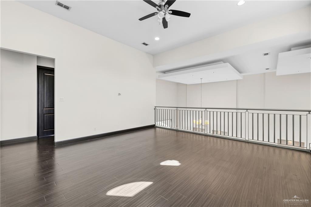101 East Emory Avenue McAllen, TX 78504 - Photo 10 of 20 a view of a hallway with wooden floor