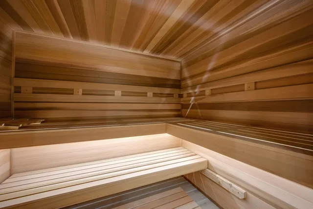 a room with furniture pool table and windows