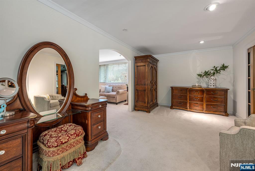 84 Bogerts Mill Road Harrington Park, NJ 07640 - Photo 24 of 47 a view of a livingroom with furniture and a mirror