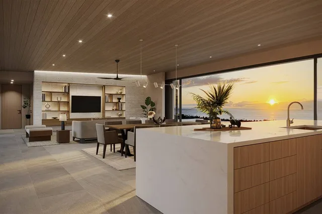 a kitchen with sink and view of living room