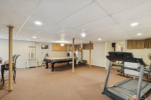 a bedroom with a bed and a table