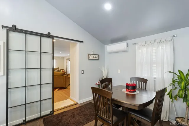 a view of a workspace with furniture