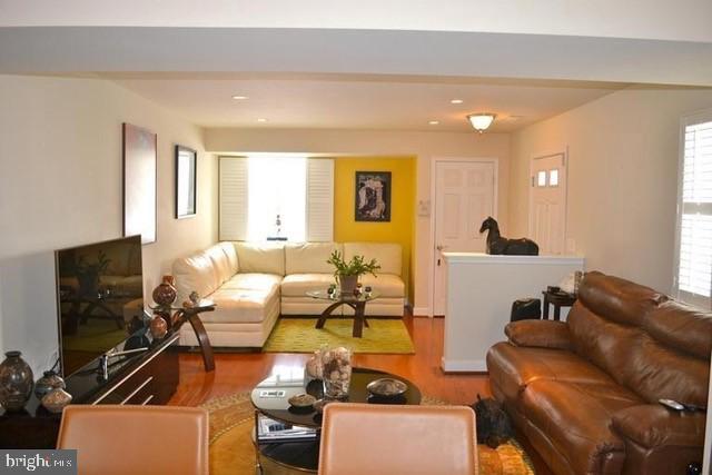 4115 South D S Four Mile Run Drive Arlington, VA 22204 - Photo 2 of 9 a living room with furniture and a flat screen tv