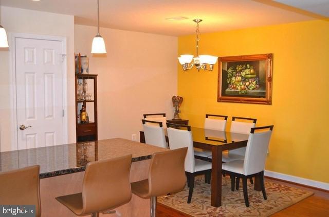 4115 South D S Four Mile Run Drive Arlington, VA 22204 - Photo 4 of 9 a dining room with furniture and window