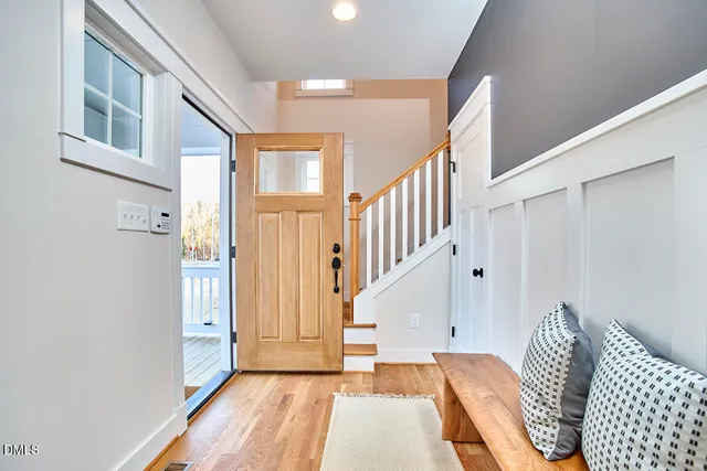 a view of a room with wooden floor and balcony