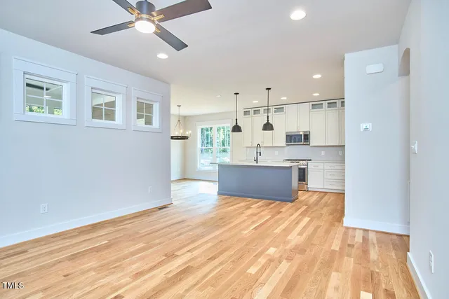 a view of kitchen with wooden floor