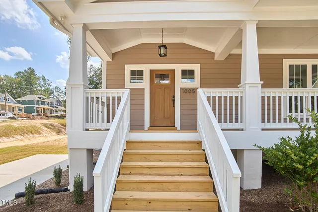a front view of a house with a porch