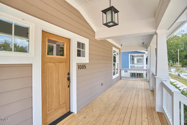 a view of a house with wooden floor and a window