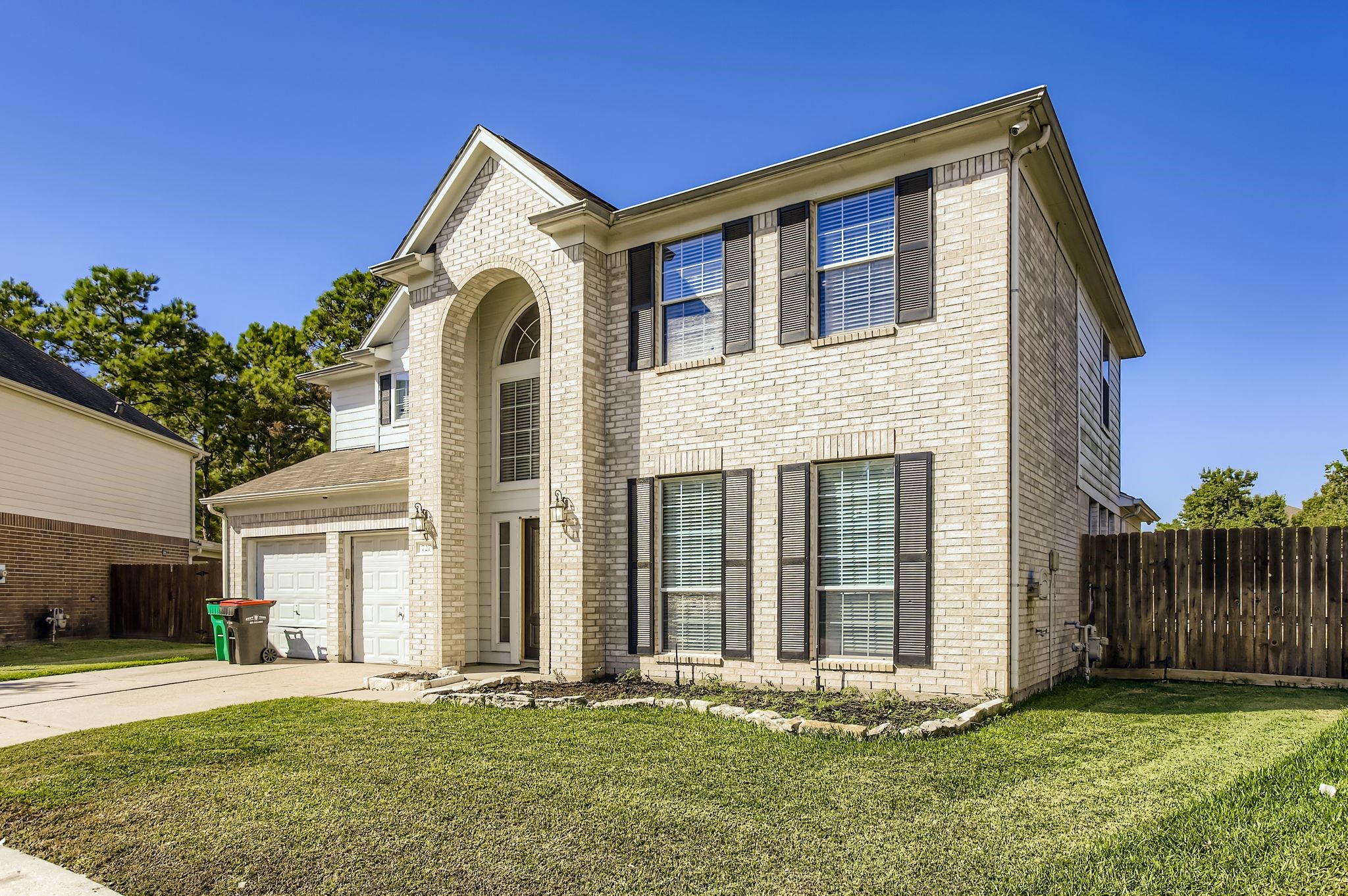 727 Pine Thicket Court Spring, TX 77373 - Photo 3 of 29 a front view of a house with a yard
