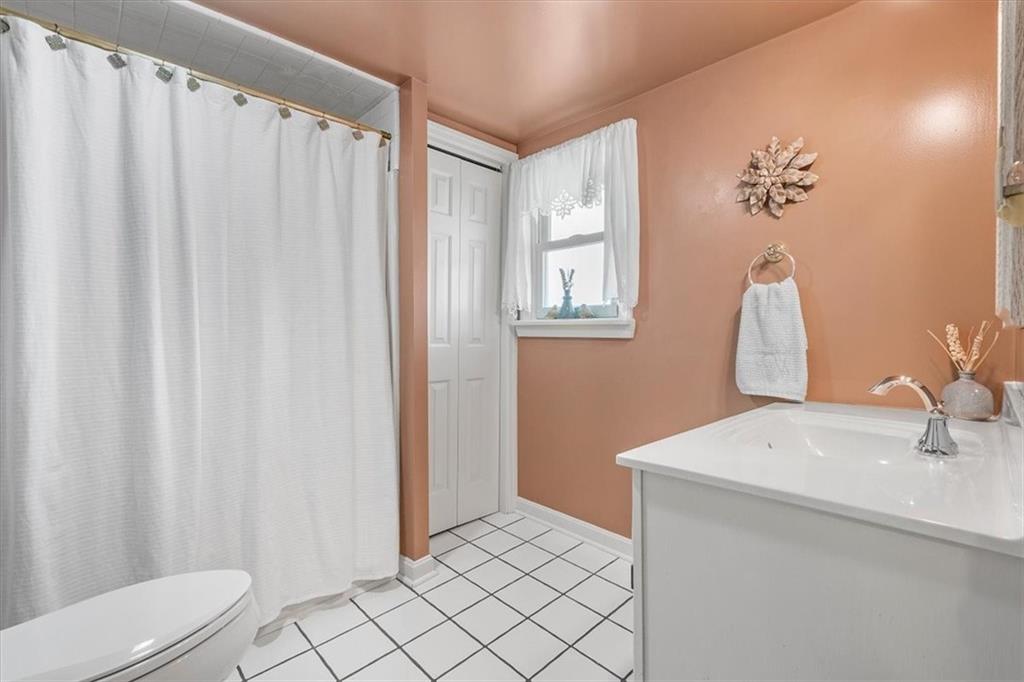 2510 South Bridge Road Washington, PA 15301 - Photo 12 of 25 a bathroom with a sink toilet and shower