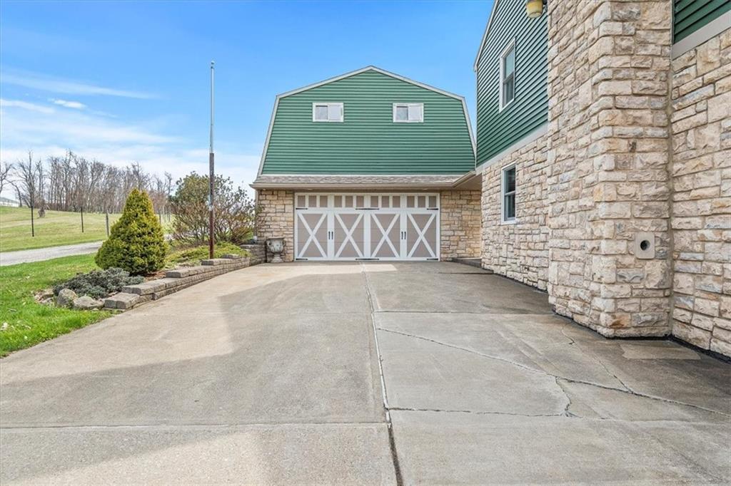 2510 South Bridge Road Washington, PA 15301 - Photo 20 of 25 a view of a yard with brick wall and a large tree