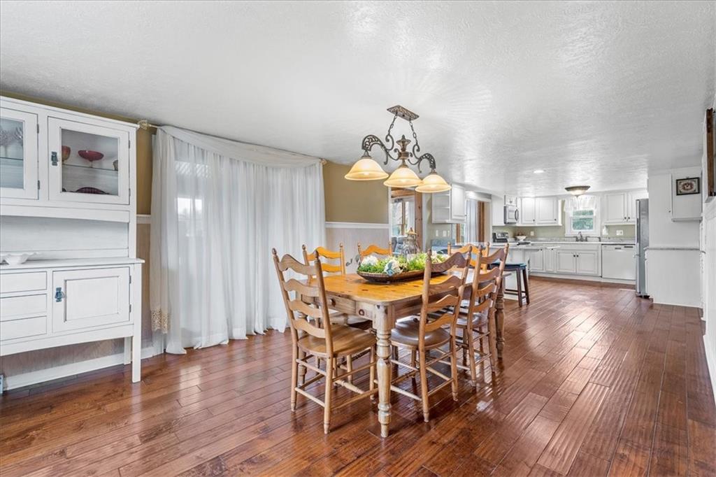 2510 South Bridge Road Washington, PA 15301 - Photo 6 of 25 a view of a dining room with furniture and wooden floor