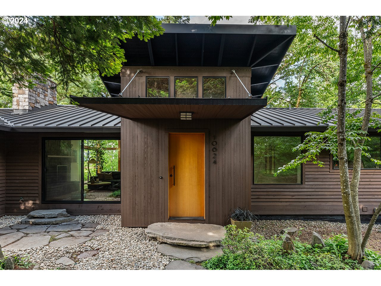 10624 Southwest 41st Avenue Portland, OR 97219 - Photo 1 of 1 a view of a porch with furniture and a yard