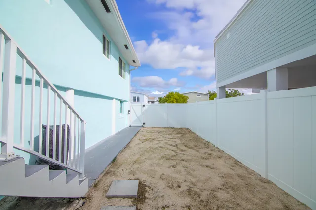 a view of outdoor kitchen and outdoor seating