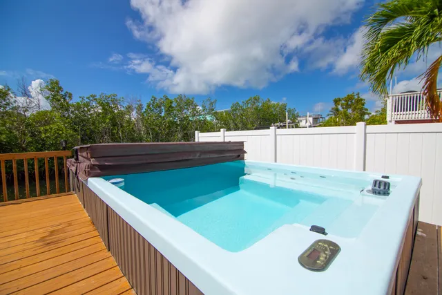 a view of a lake with a lot of flowers