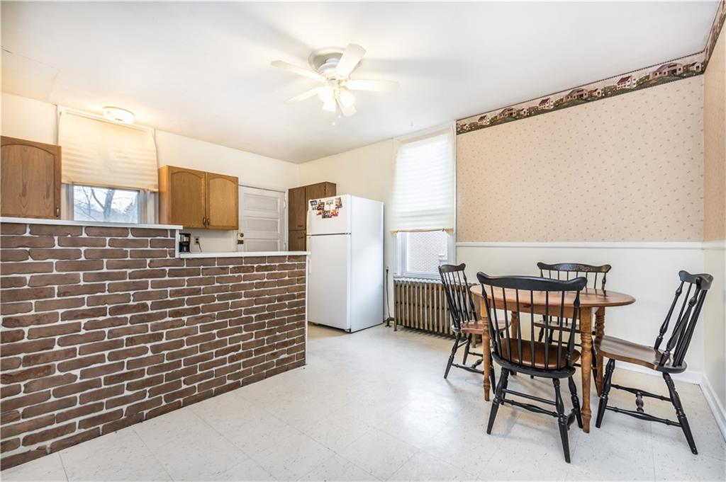 1549 McFarland Road Pittsburgh, PA 15216 - Photo 17 of 25 a view of a dining room with furniture