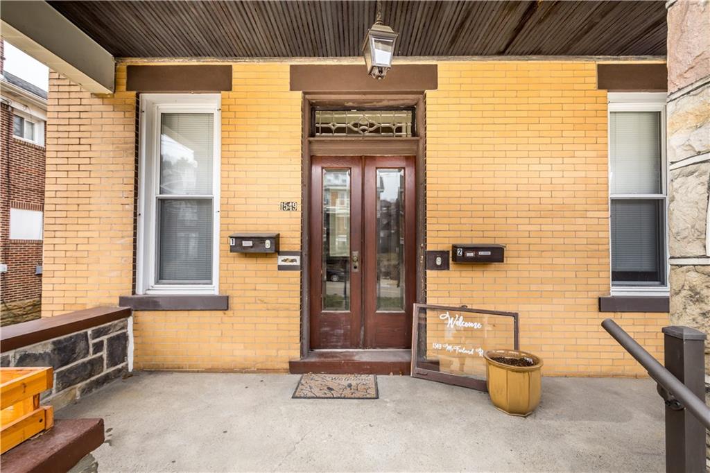 1549 McFarland Road Pittsburgh, PA 15216 - Photo 3 of 25 a view of entrance door of the house