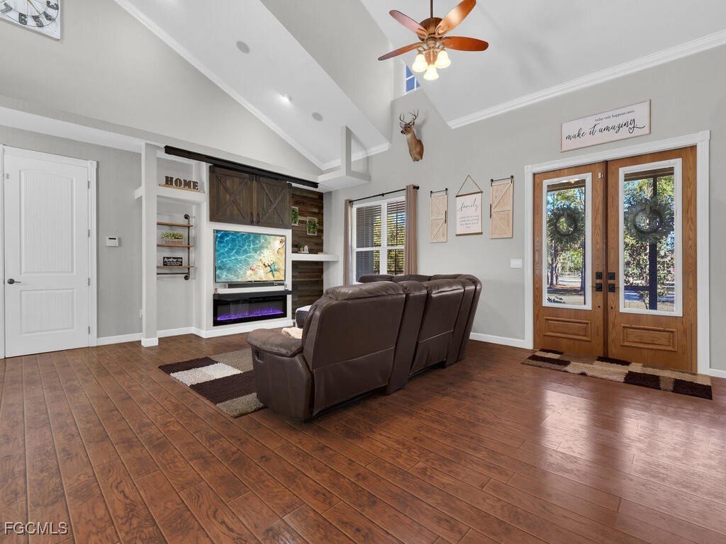 6041 Alan Boulevard Punta Gorda, FL 33982 - Photo 11 of 44 a living room with furniture window and wooden floor