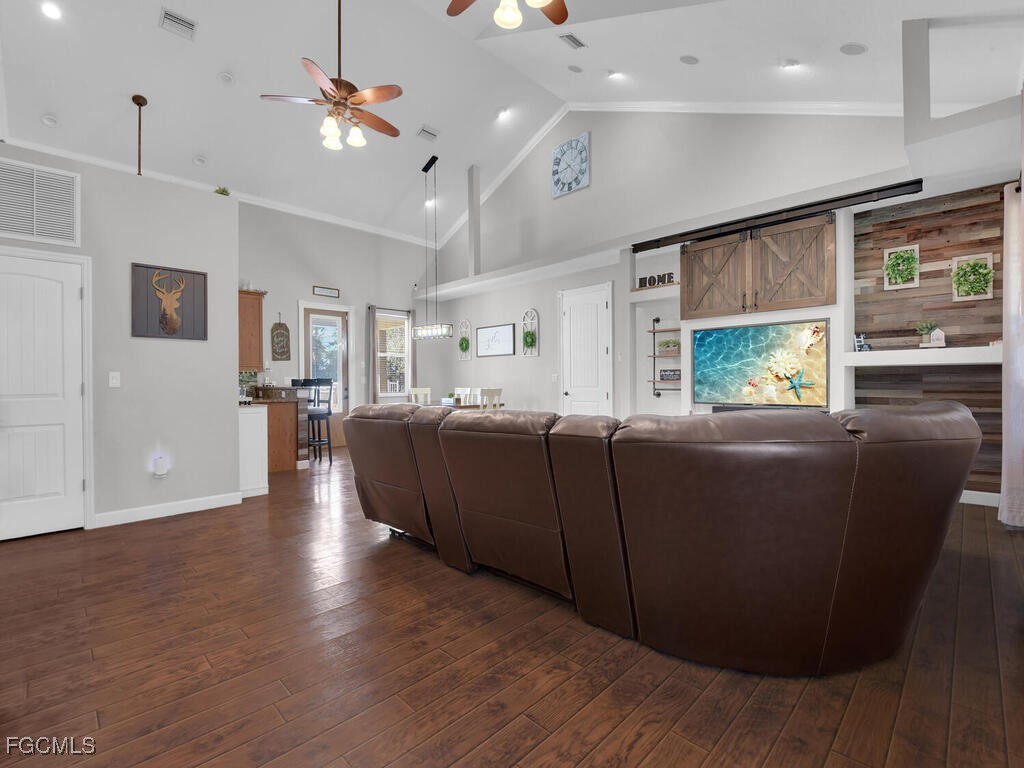 6041 Alan Boulevard Punta Gorda, FL 33982 - Photo 12 of 44 a living room with furniture window and wooden floor